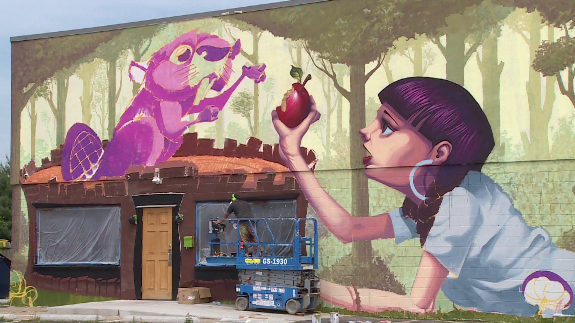 Photos: Is mural of girl feeding beaver at adult bookstore taboo?
